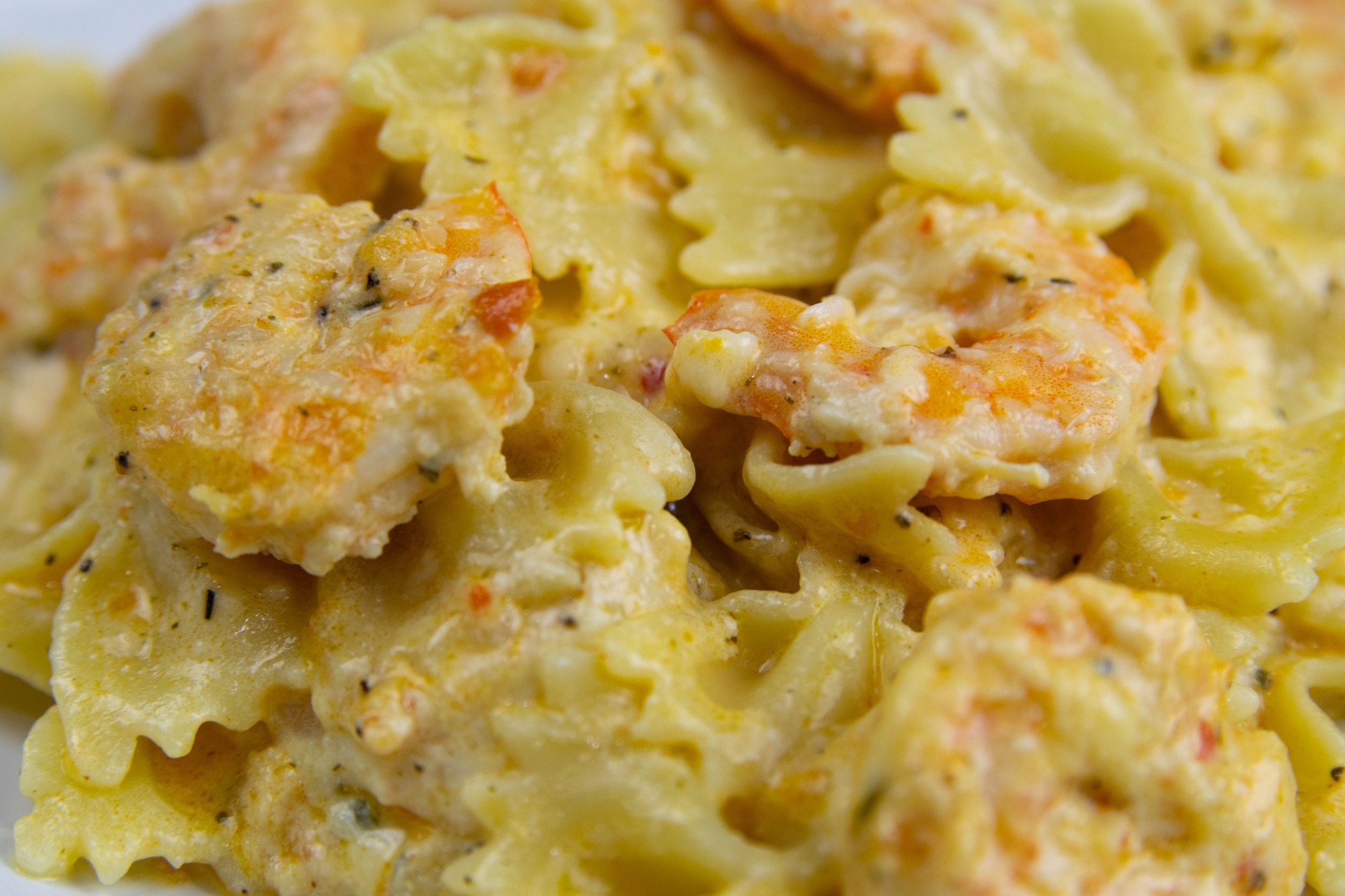pasta shrimp cream sauce and seafood prawn menu concept. food background. top view