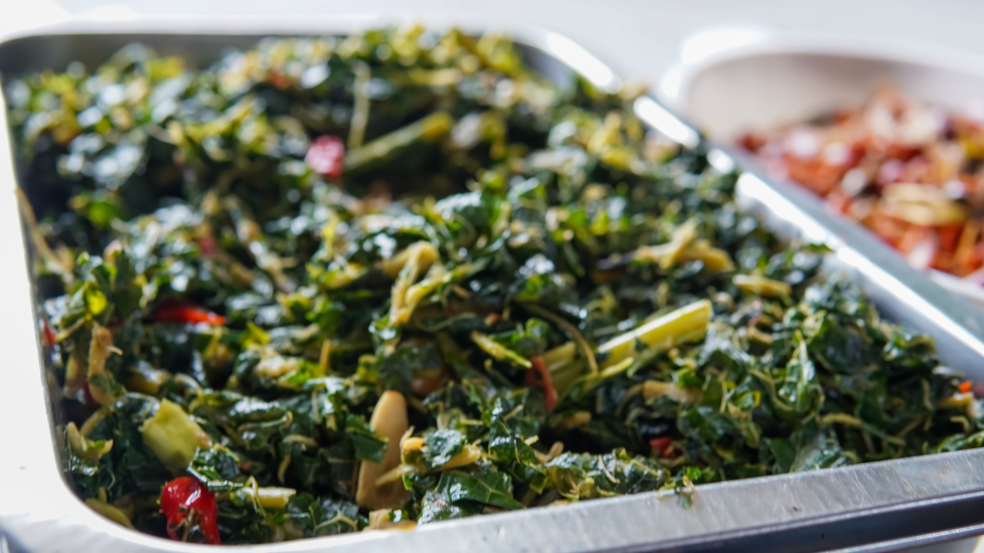 Stir Fry Papaya Leaves or Tumis Daun Pepaya Made from Boiled Papaya Leaves with Spice and Chilli. Usually add Fried Anchovies. Sometimes Called Buntil